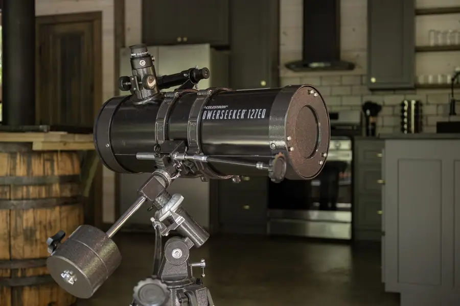 Large telescope in the main cabin near the kitchen